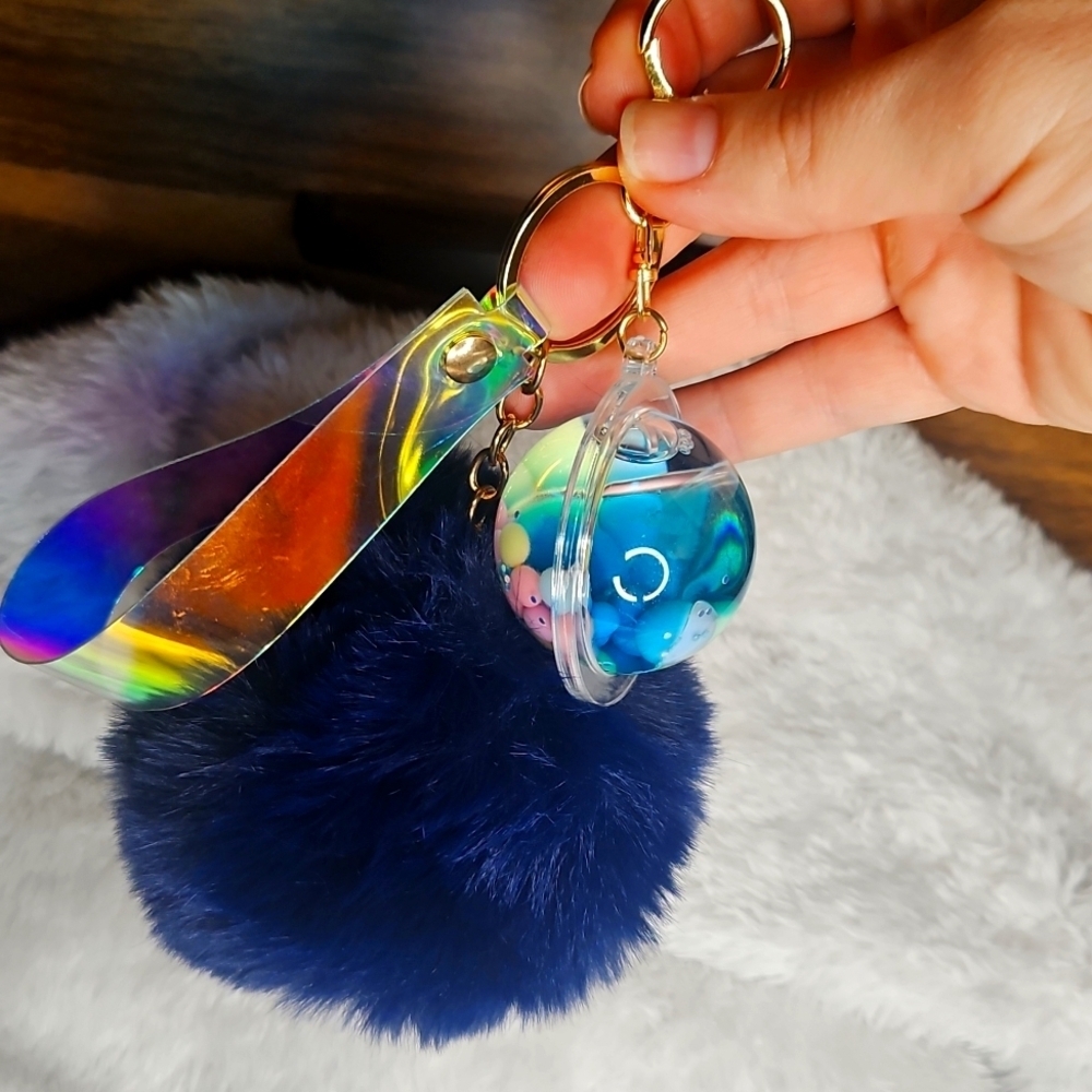 Saturn Inspired Navy Fluffy Pom Pom Keychain - Picture 4 of 5